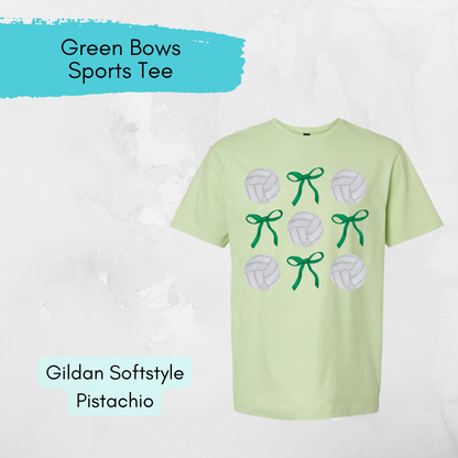 Light green t-shirt with volleyball designs and green bows on a white background