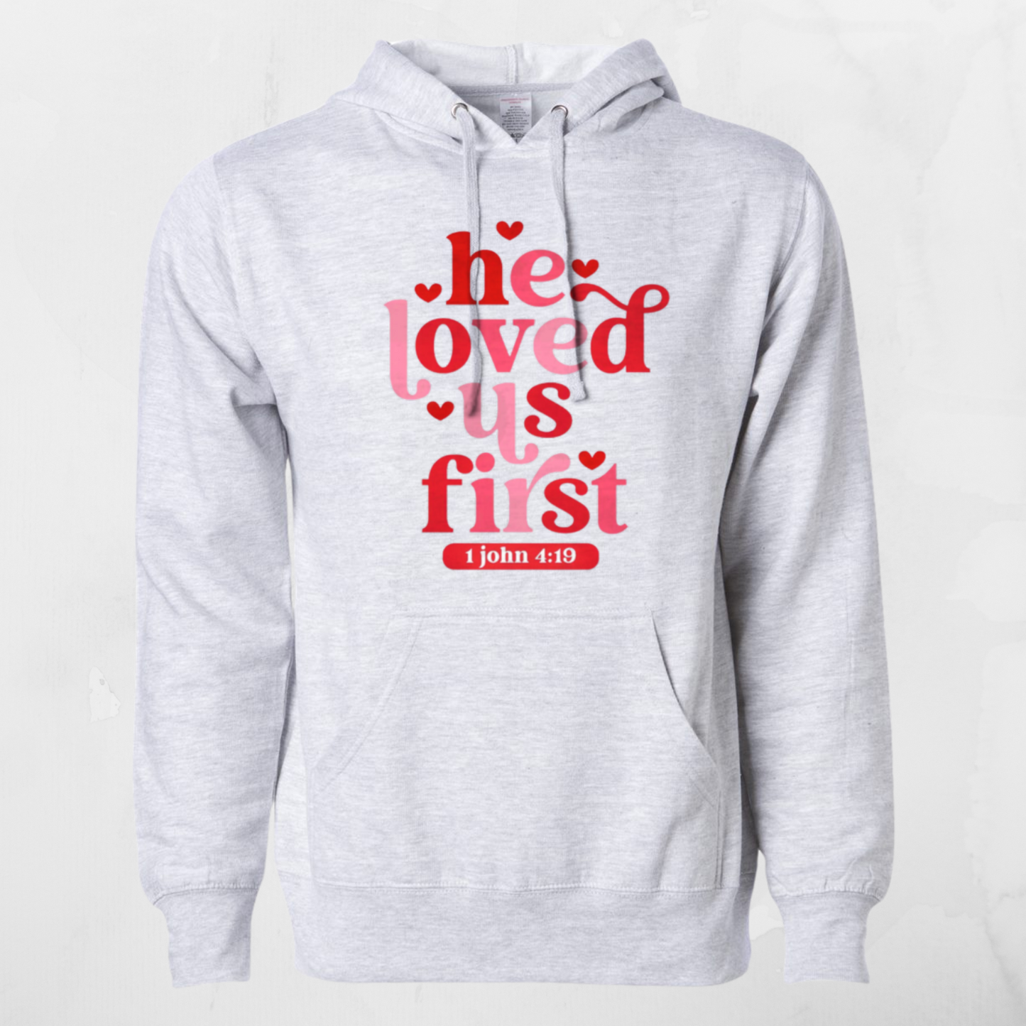 He Loved Us First Hooded Sweatshirt